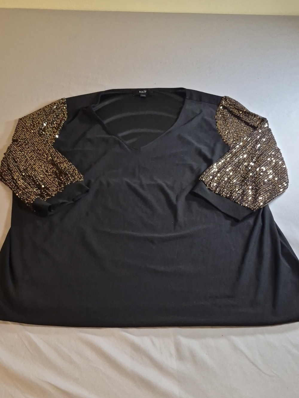 NAIF Black V-Neck Top with Gold Sequin Puff Sleeves